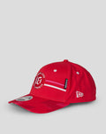 Profile view of a red Welsh Fire cap showing the New Era logo on the side and front crest